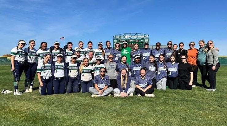 Group photo of alumni game softball 2024 teams.